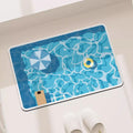 Rectangular bath mat with blue swimming pool print, water ripple design, and non-slip rubber backing.