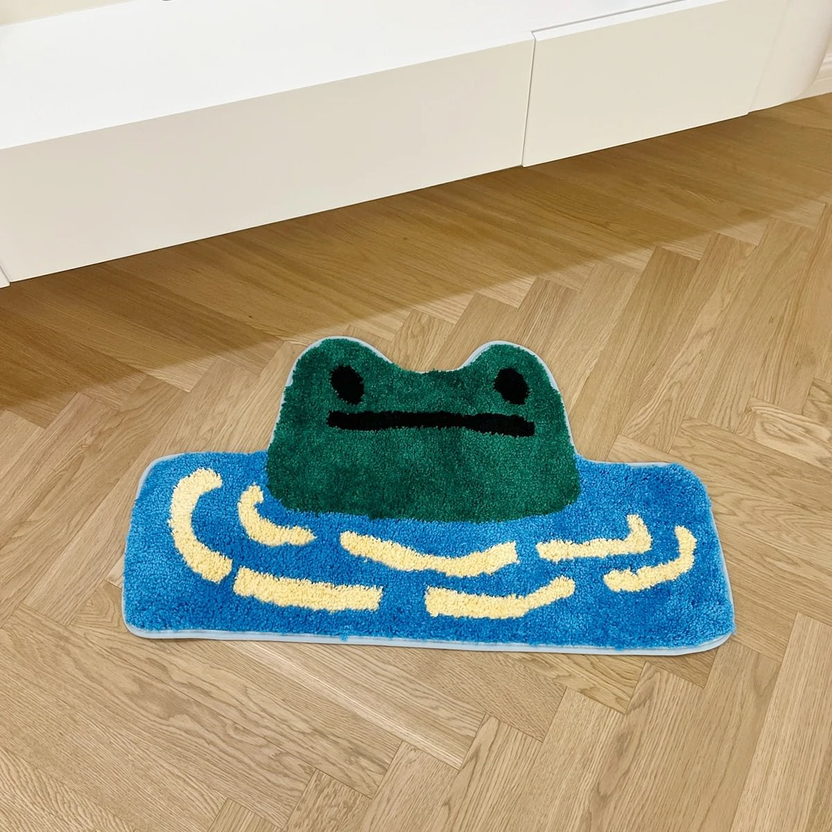 green frog in a blue pond cute tufted accent rug