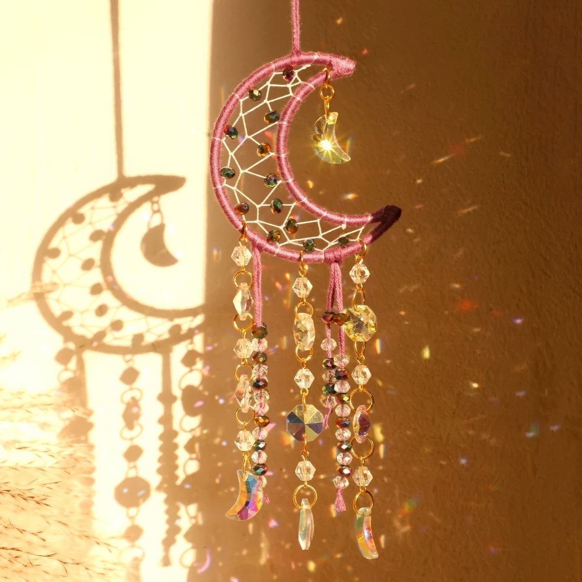 Cream ivory crescent moon dream catcher suncatcher with woven macrame web, cascading iridescent crystal bead strands and AB moon charms