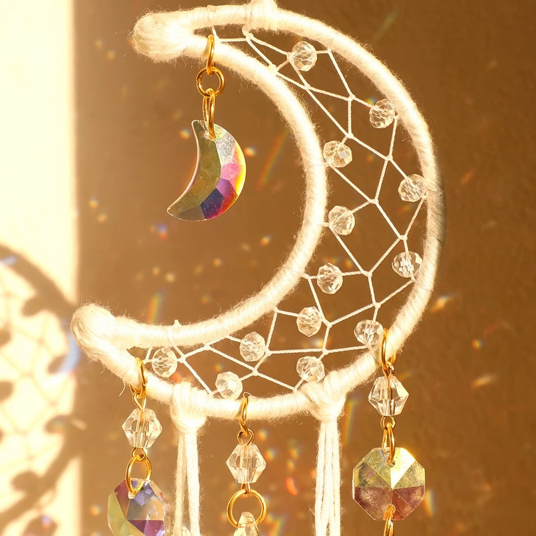 Cream ivory crescent moon dream catcher suncatcher with woven macrame web, cascading iridescent crystal bead strands and AB moon charms