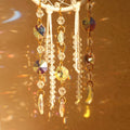 Cream ivory crescent moon dream catcher suncatcher with woven macrame web, cascading iridescent crystal bead strands and AB moon charms