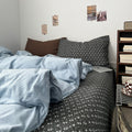 Dark academia bedding set with sky blue washed duvet cover and charcoal ditsy floral fitted sheet