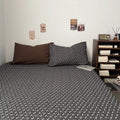 Dark academia bedding set with sky blue washed duvet cover and charcoal ditsy floral fitted sheet