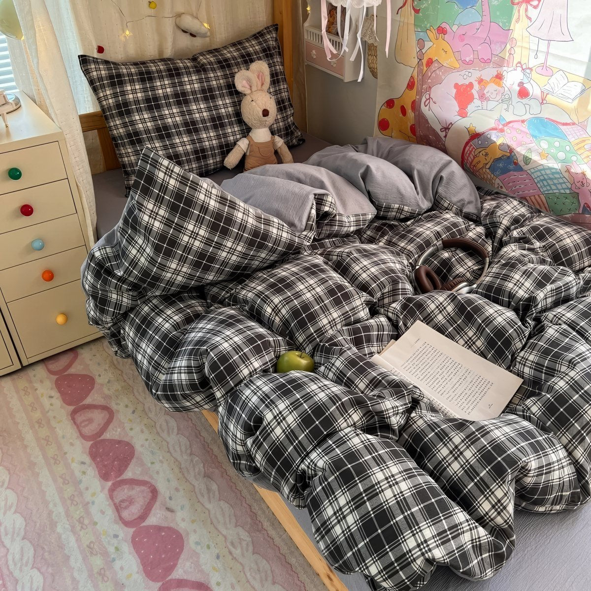 Black and brown plaid bubble crinkle bedding set with matching pillows on a cozy bedroom bed
