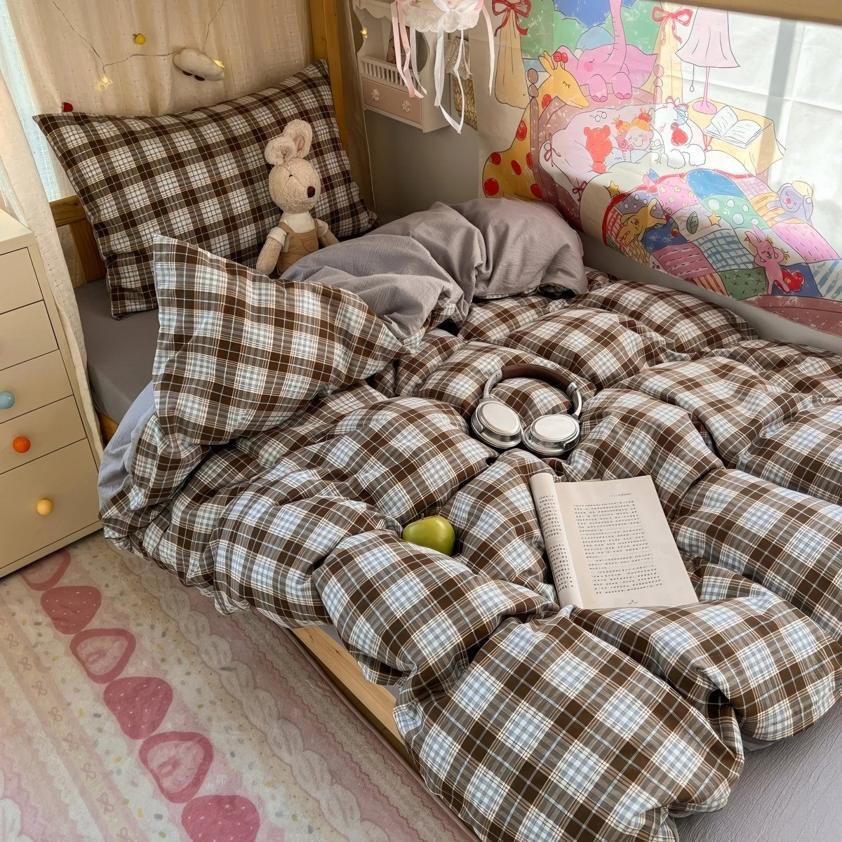 Black and brown plaid bubble crinkle bedding set with matching pillows on a cozy bedroom bed