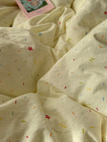 yellow creamy pastel bedding set with colorful sprinkles print pattern 