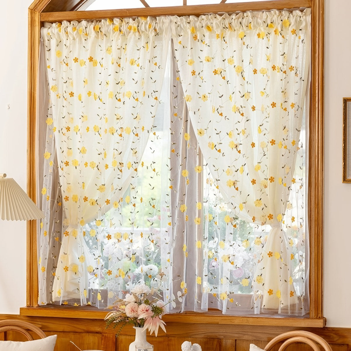 Sheer curtain with yellow floral pattern 