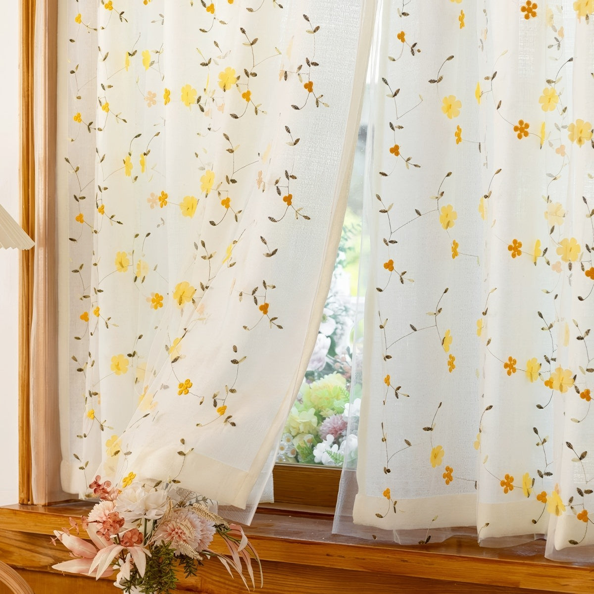 Sheer curtain with yellow floral pattern 