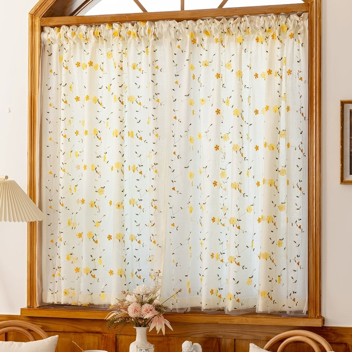 Sheer curtain with yellow floral pattern 