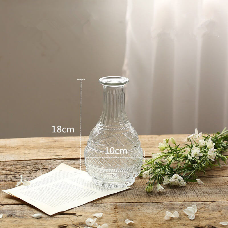 vintage styled bottle shaped glass vase in cottagecore aesthetic decor roomtery