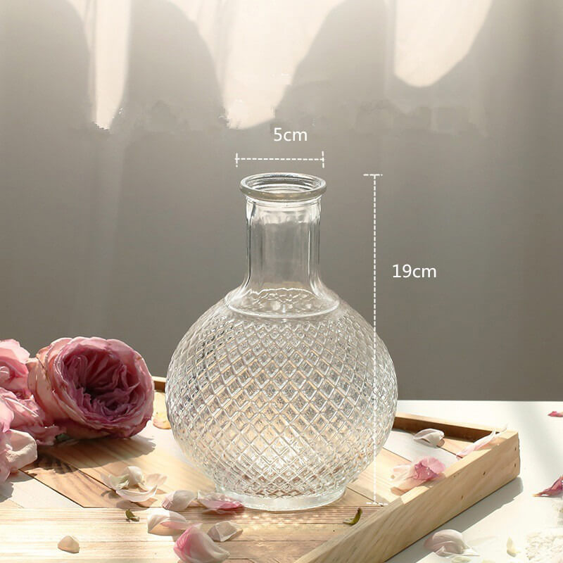 vintage styled bottle shaped glass vase in cottagecore aesthetic decor roomtery