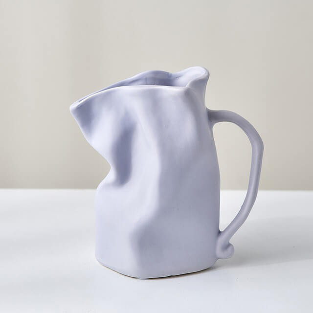 https://roomtery.com/cdn/shop/products/minimalit-aesthetic-crumple-tyle-mug-shaped-ceramic-vase-roomtery2.jpg?v=1679655961
