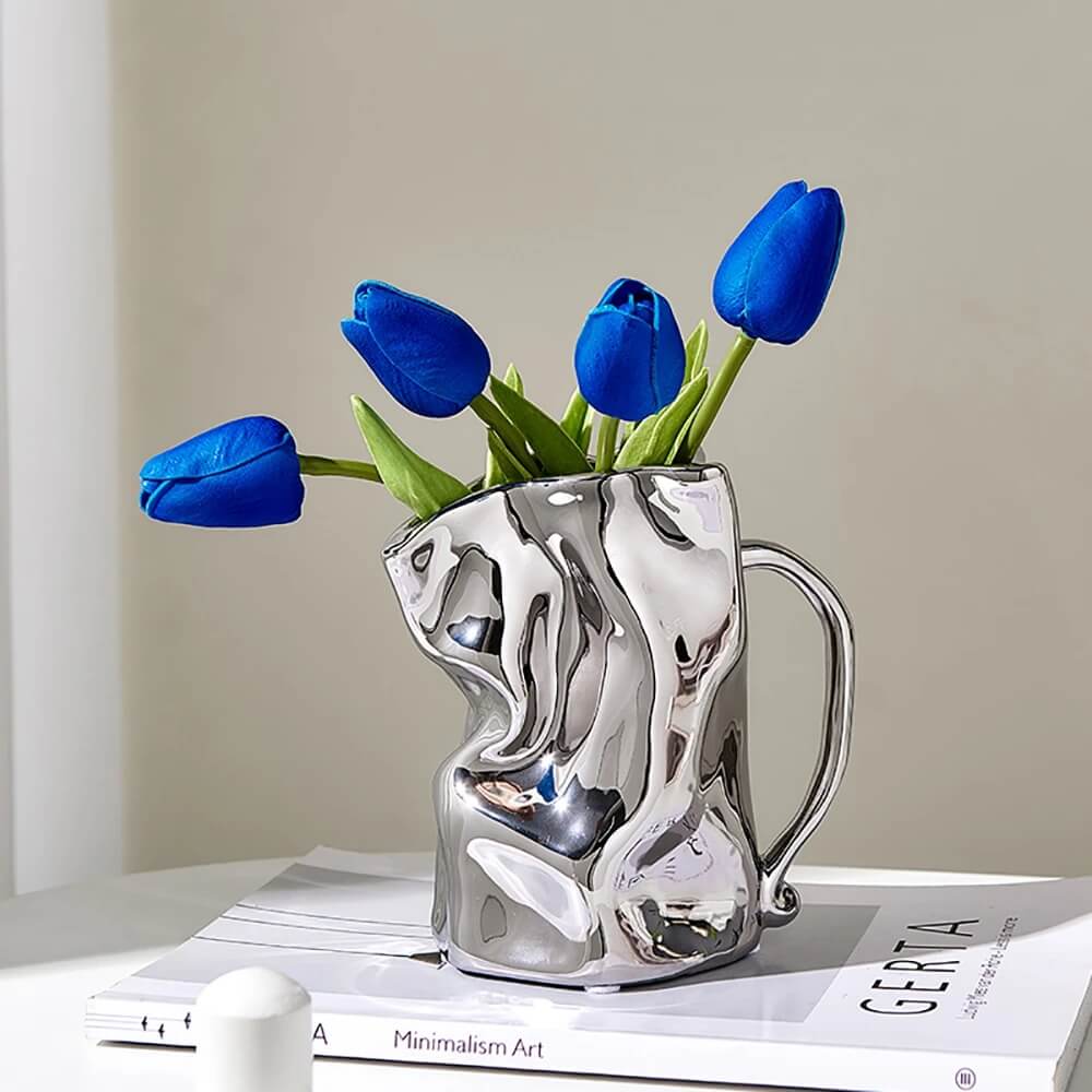 https://roomtery.com/cdn/shop/products/minimalit-aesthetic-crumple-tyle-mug-shaped-ceramic-vase-roomtery7.jpg?v=1679655961&width=1946