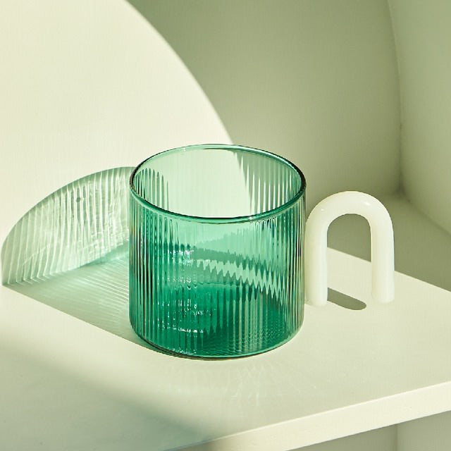 https://roomtery.com/cdn/shop/products/retro-striped-ripple-glass-vintage-mug-with-arch-handle-room-decor-roomtery6.jpg?v=1660317800&width=1946