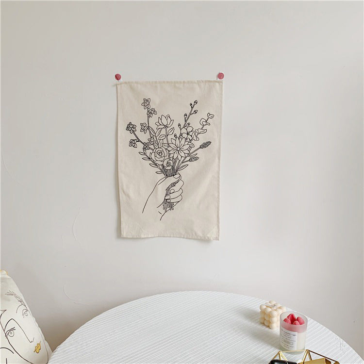 outline print hand holding wild flowers bouquet mini canvas tapestry roomtery